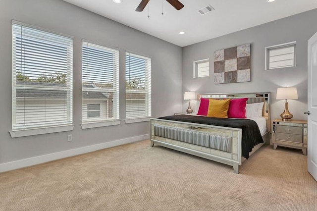 carpeted bedroom featuring ceiling fan