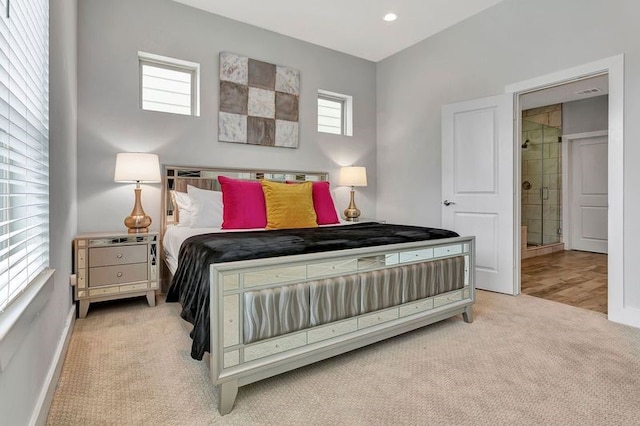 bedroom with light colored carpet