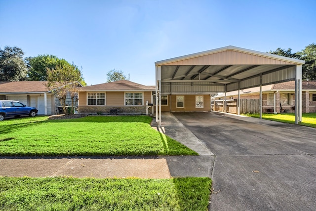 view of front of property featuring a carport and a front lawn