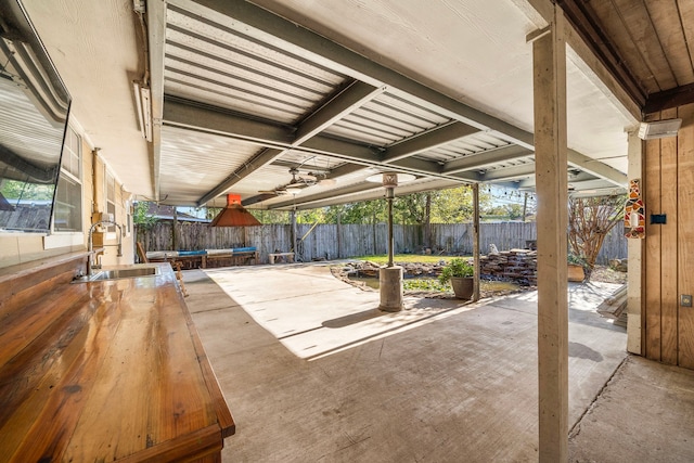 view of patio with sink and a trampoline