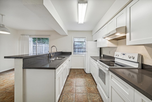 kitchen featuring white appliances, ventilation hood, sink, hanging light fixtures, and kitchen peninsula