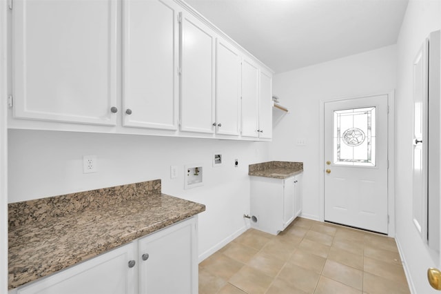 laundry area with cabinets, washer hookup, light tile patterned floors, and hookup for an electric dryer