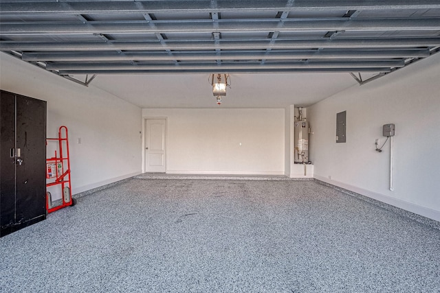 garage with gas water heater, electric panel, and a garage door opener