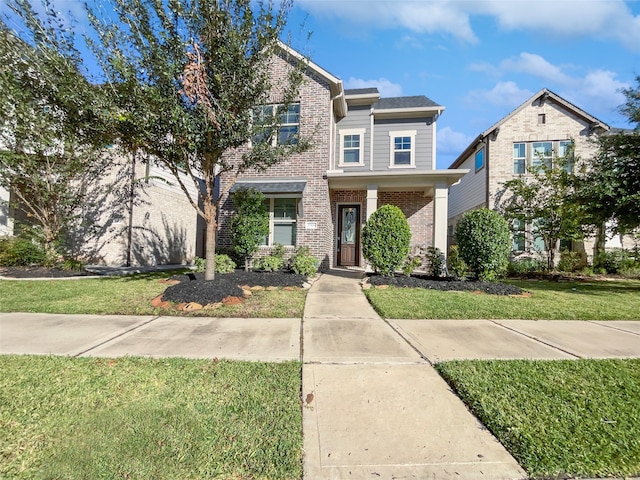 view of front of house featuring a front yard