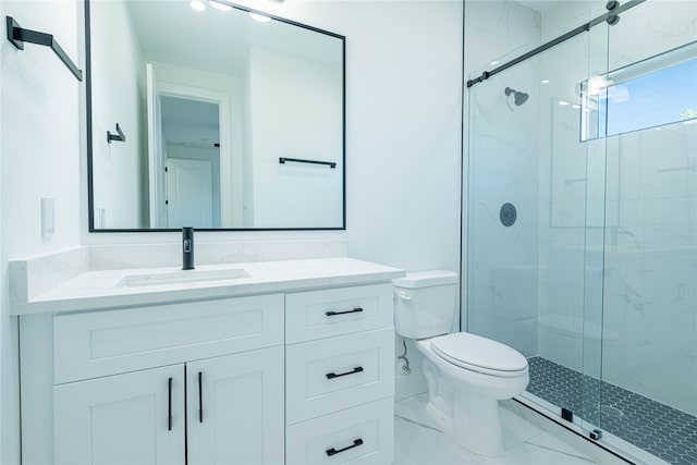 bathroom featuring vanity, toilet, and walk in shower