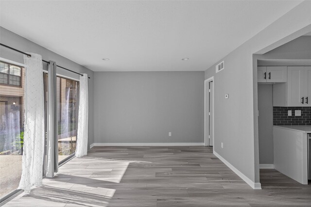 12900 Walden Rd Unit 419D, Montgomery, TX 77356 - unfurnished room with light wood finished floors and baseboards