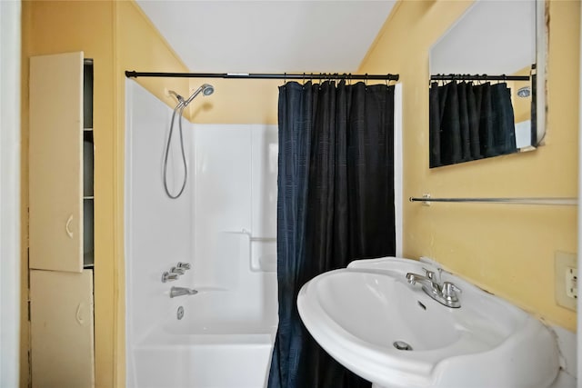 bathroom with sink and shower / tub combo