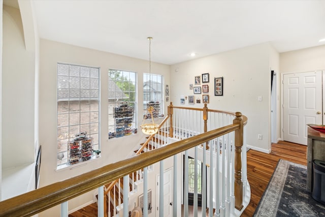 hall with dark hardwood / wood-style floors