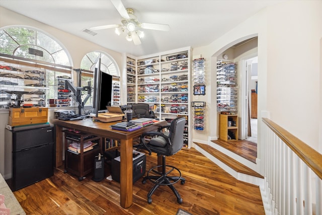 office featuring dark hardwood / wood-style floors and ceiling fan