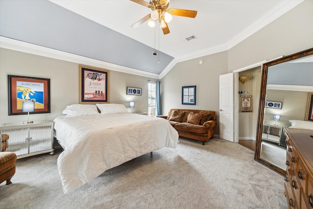 bedroom featuring ceiling fan, ornamental molding, light carpet, and vaulted ceiling