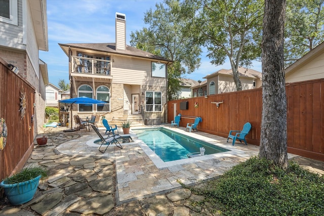 view of pool with a patio area