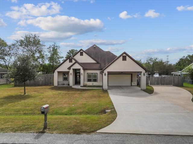 view of front facade featuring a garage and a front lawn