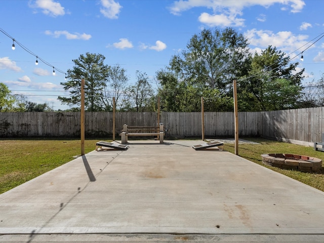 view of patio / terrace featuring an outdoor fire pit