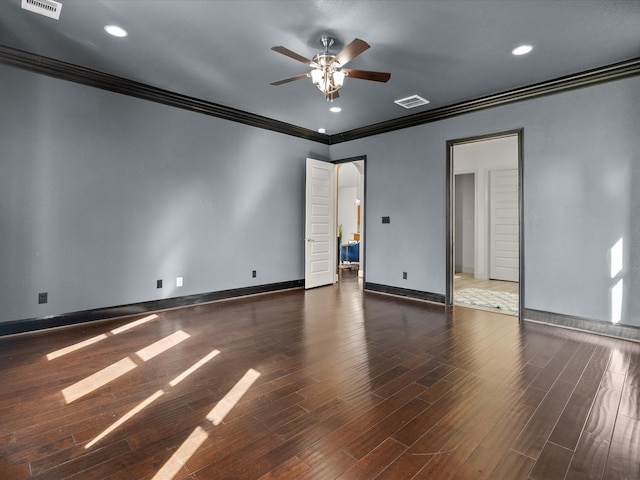 unfurnished room featuring dark hardwood / wood-style floors, ceiling fan, and ornamental molding