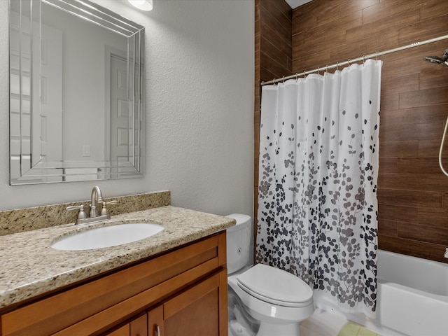 full bathroom featuring vanity, toilet, and shower / bathtub combination with curtain