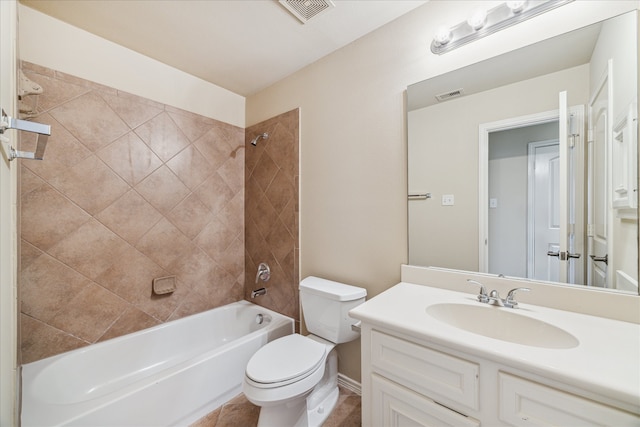 full bathroom featuring vanity, toilet, and tiled shower / bath