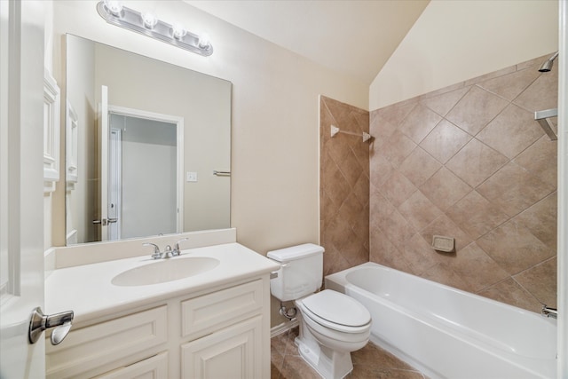 full bathroom with tiled shower / bath combo, tile patterned flooring, lofted ceiling, toilet, and vanity