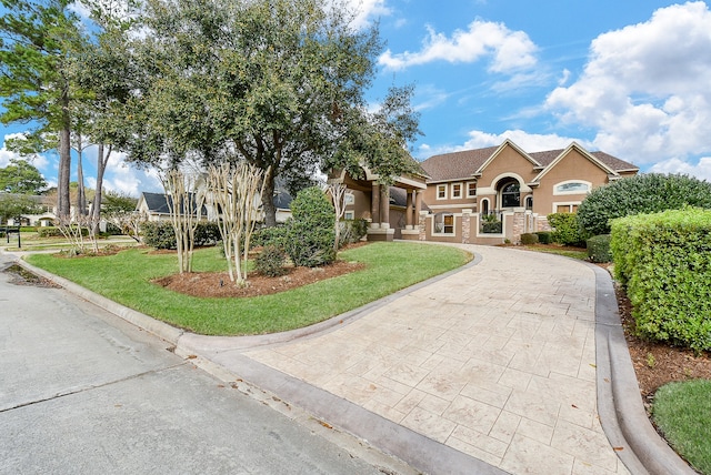 view of front facade with a front lawn