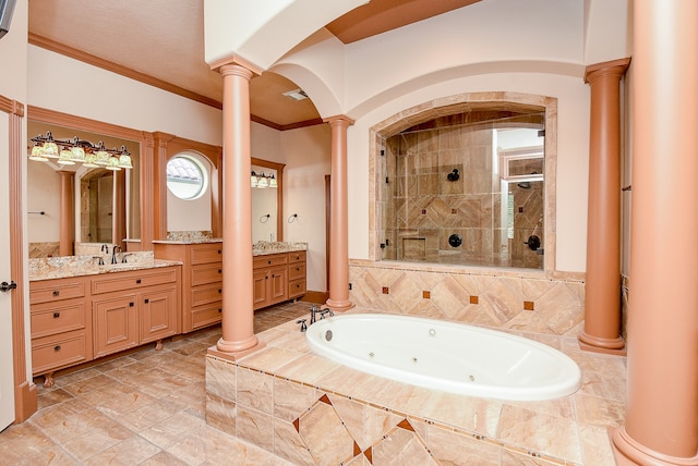 bathroom featuring vanity, ornate columns, crown molding, and independent shower and bath