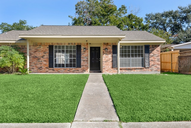 ranch-style house with a front yard