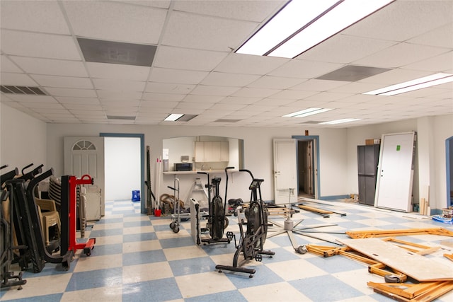 gym with a drop ceiling