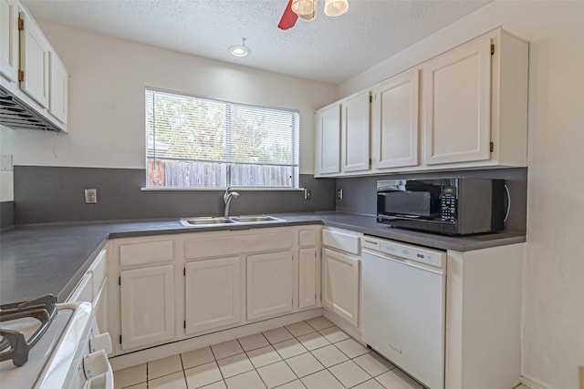 kitchen with sink, white appliances, and white cabinets