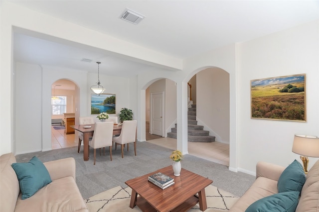 living room featuring light tile patterned flooring