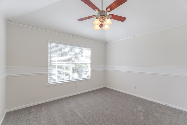 unfurnished room featuring ornamental molding, carpet floors, ceiling fan, and lofted ceiling