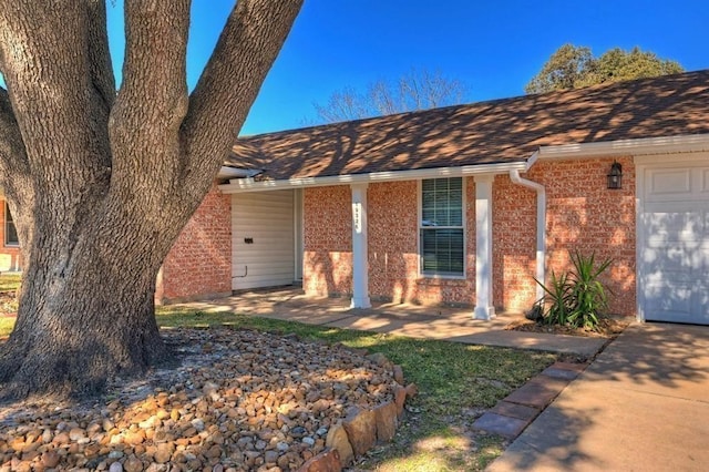 single story home with a garage