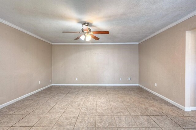 unfurnished room with a textured ceiling, ceiling fan, and crown molding