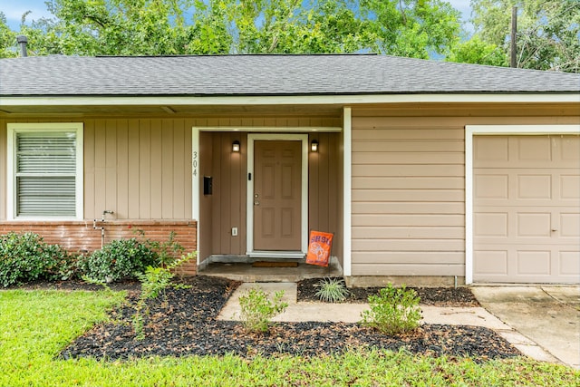 entrance to property with a garage