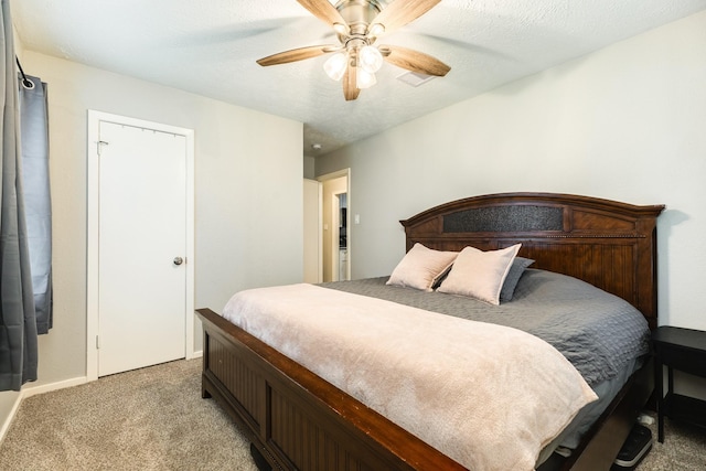 bedroom with light colored carpet and ceiling fan