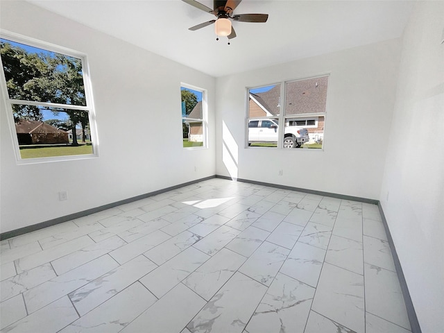 spare room featuring ceiling fan