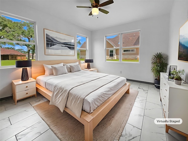 145 Birdie Dr, Hempstead, TX 77445 - bedroom featuring light marble finish floors and baseboards