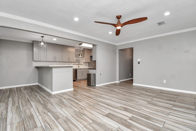 kitchen with gray cabinetry, tasteful backsplash, hanging light fixtures, crown molding, and stainless steel dishwasher