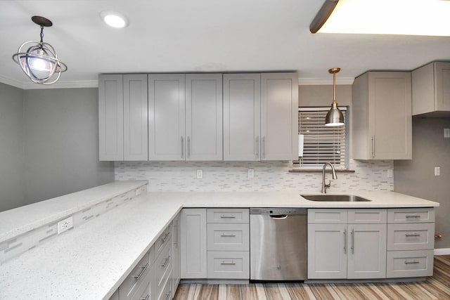 kitchen with hanging light fixtures, dishwasher, sink, and gray cabinets