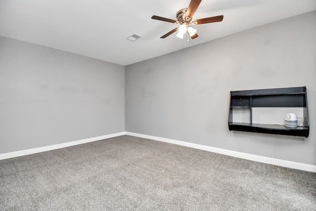 empty room with carpet and ceiling fan