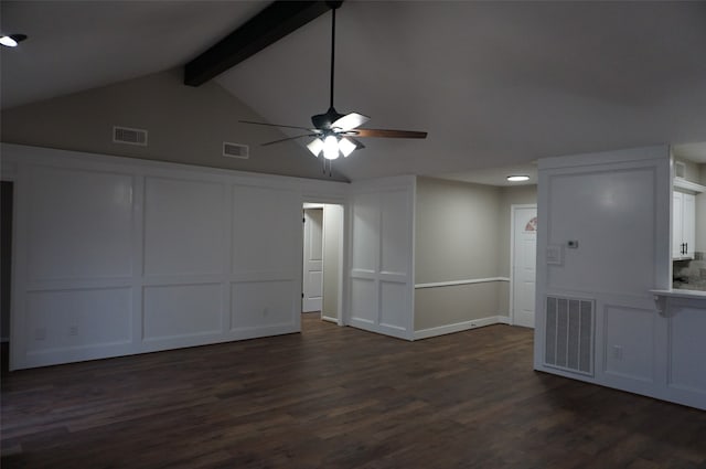 unfurnished living room featuring dark hardwood / wood-style floors, lofted ceiling with beams, and ceiling fan