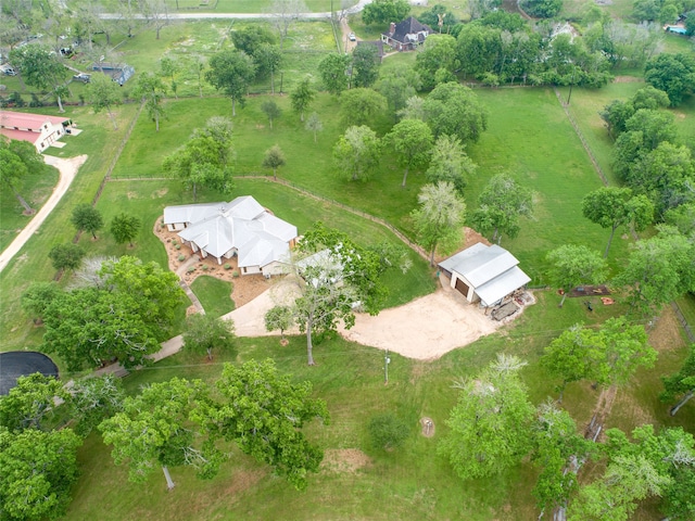 birds eye view of property featuring a rural view