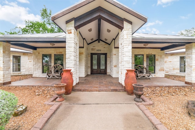 doorway to property featuring french doors