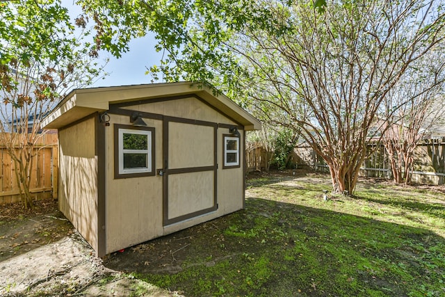 view of outdoor structure with a lawn