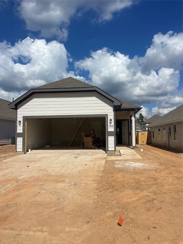 view of front of property with a garage