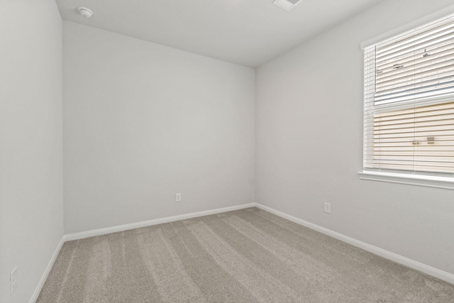 empty room with carpet flooring