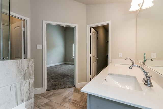 bathroom with vanity and vaulted ceiling