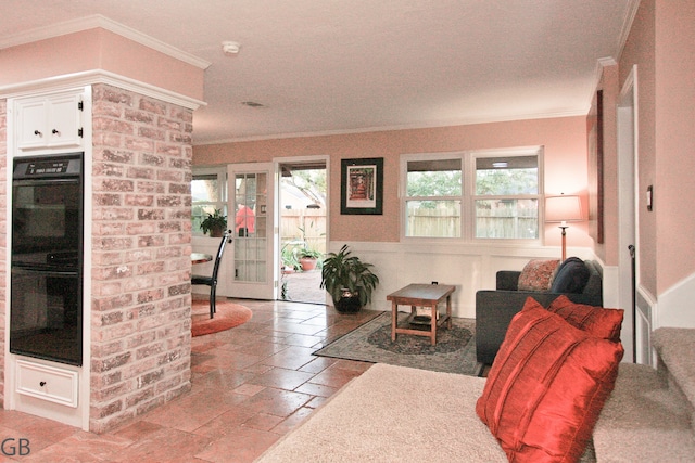 living room with ornamental molding