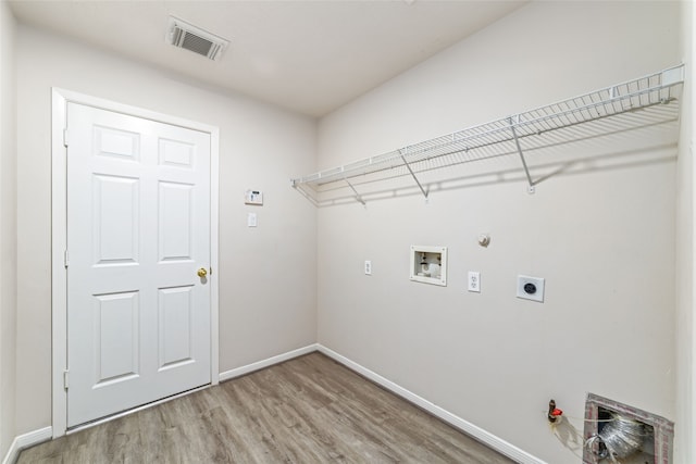 laundry room featuring gas dryer hookup, laundry area, hookup for a washing machine, and visible vents