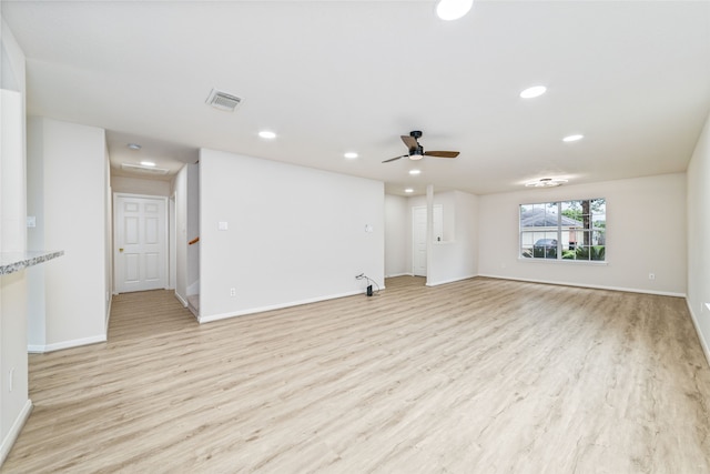 unfurnished room featuring light wood finished floors, ceiling fan, baseboards, and recessed lighting