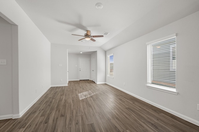 unfurnished bedroom featuring dark hardwood / wood-style floors and ceiling fan