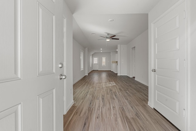 interior space featuring ceiling fan and light hardwood / wood-style flooring