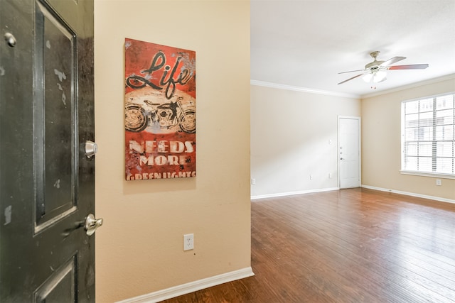 entrance foyer with crown molding, hardwood / wood-style floors, and ceiling fan